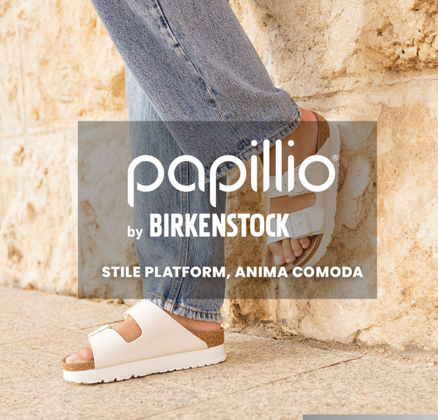 Donna con sandali Papillio by Birkenstock bianchi modello platform, stile casual e comfort per l’estate.