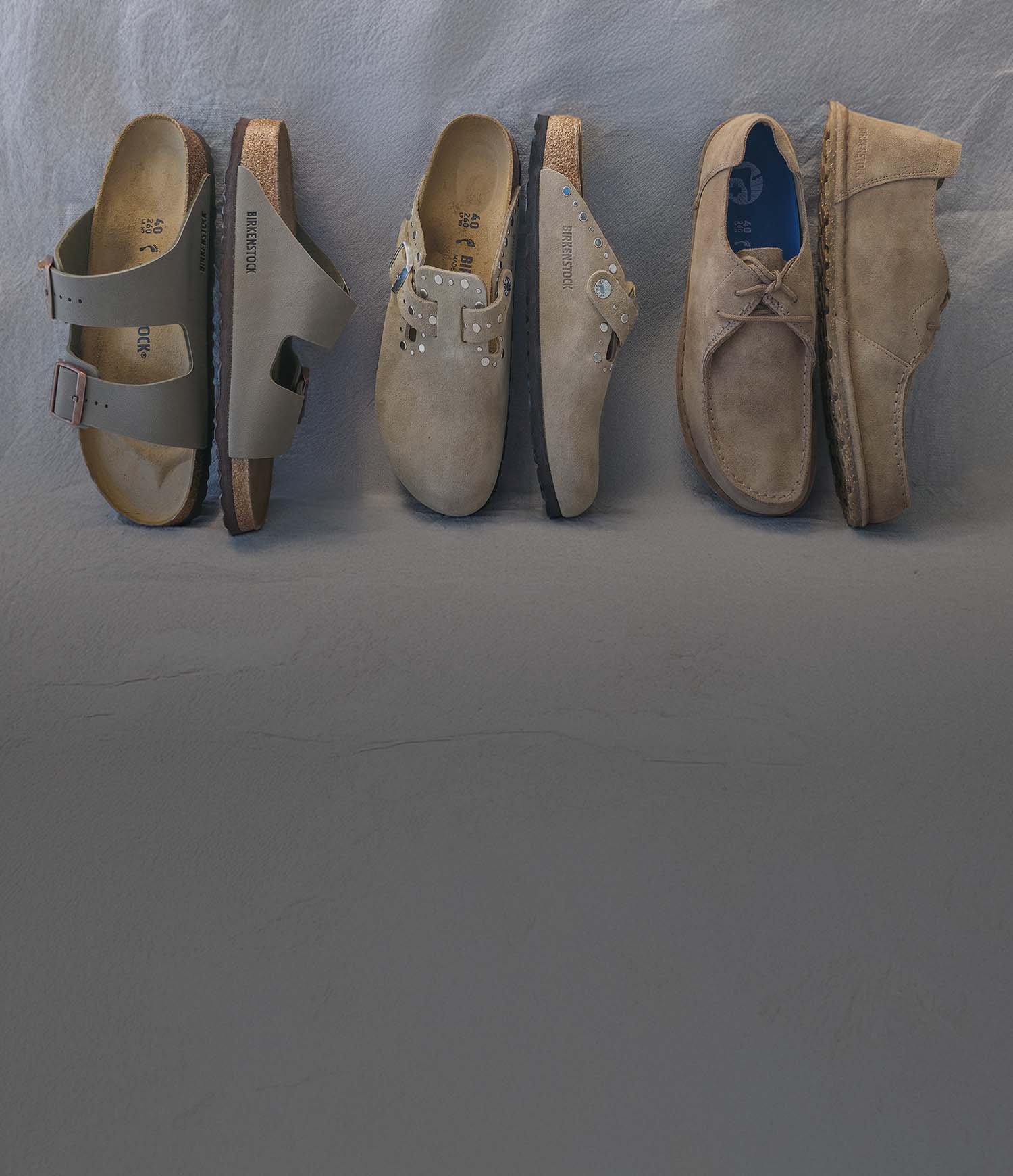 Primo piano di Birkenstock Arizona stone, boston con le borchie e scarpe utti 